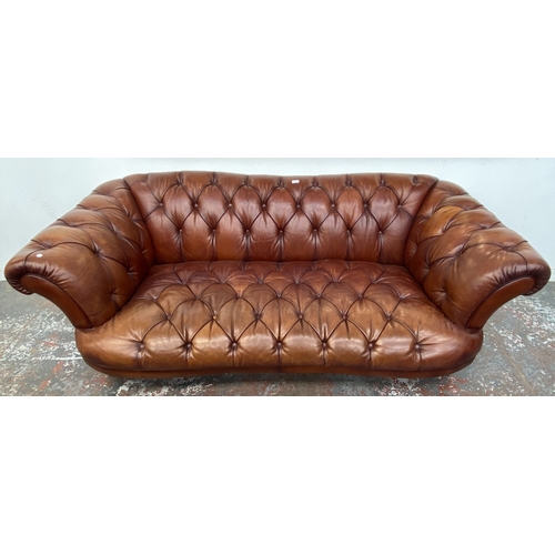 A Tetrad Oskar tan buffalo leather Chesterfield three seater sofa on ...