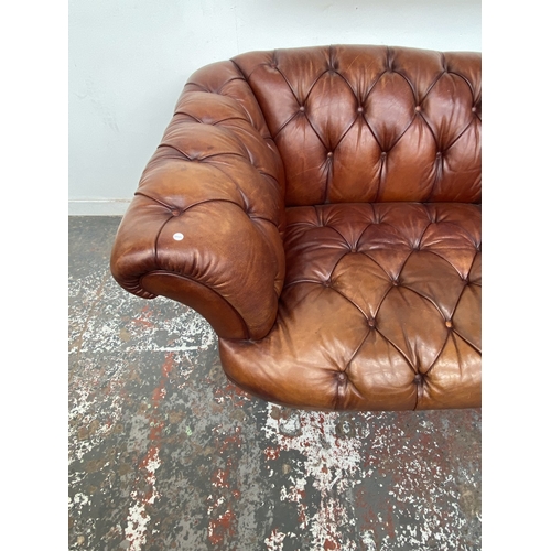A Tetrad Oskar tan buffalo leather Chesterfield three seater sofa on ...