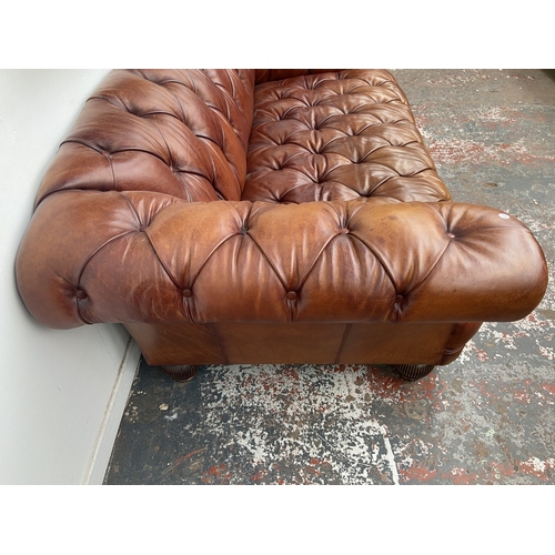 A Tetrad Oskar tan buffalo leather Chesterfield three seater sofa on ...