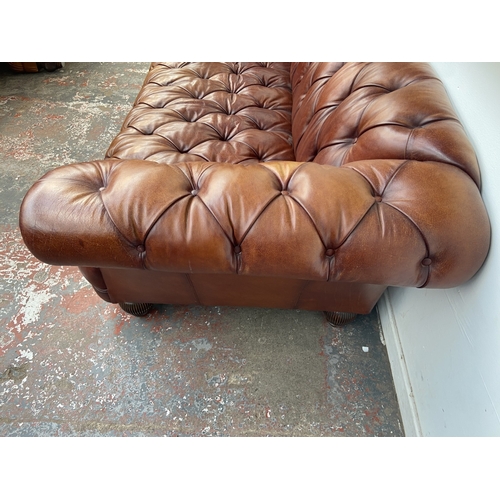 A Tetrad Oskar tan buffalo leather Chesterfield three seater sofa on ...