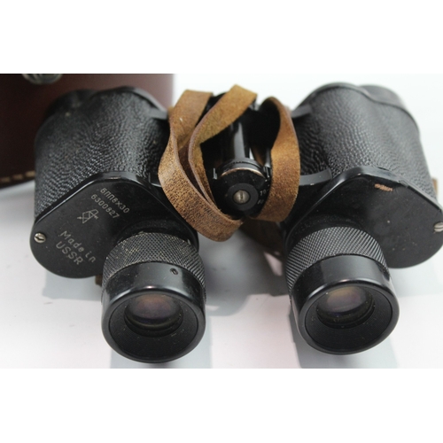 A part-cased pair of KOMZ БПП 8x30 binoculars - made in U.S.S.R.