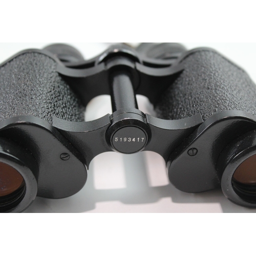 65 - A pair of Carl Zeiss Jenoptem 8x30W multi-coated binoculars