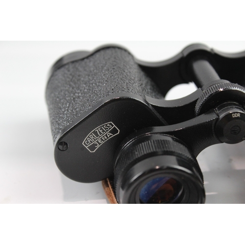 65 - A pair of Carl Zeiss Jenoptem 8x30W multi-coated binoculars
