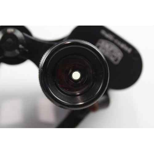 65 - A pair of Carl Zeiss Jenoptem 8x30W multi-coated binoculars