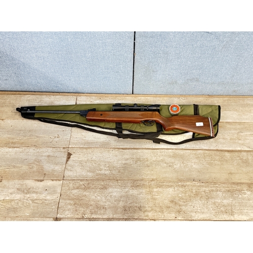 631 - A cased Edgar Brothers Hatsan MOD .60 S .22cal air rifle with Hawke 4x32 scope