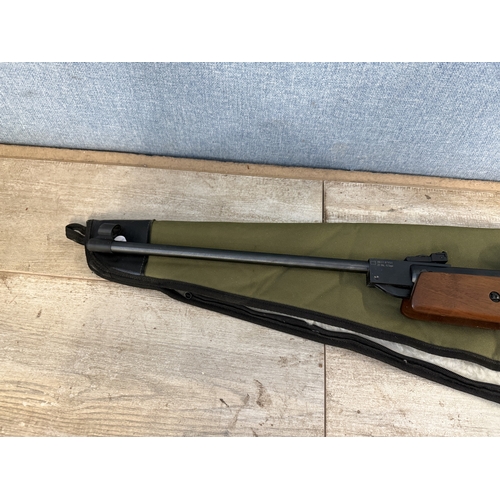 631 - A cased Edgar Brothers Hatsan MOD .60 S .22cal air rifle with Hawke 4x32 scope