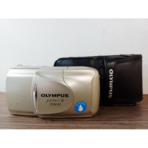 182 - A cased silver Olympus µ[mju:]-II Zoom 80 all-weather compact 35mm camera with remote control