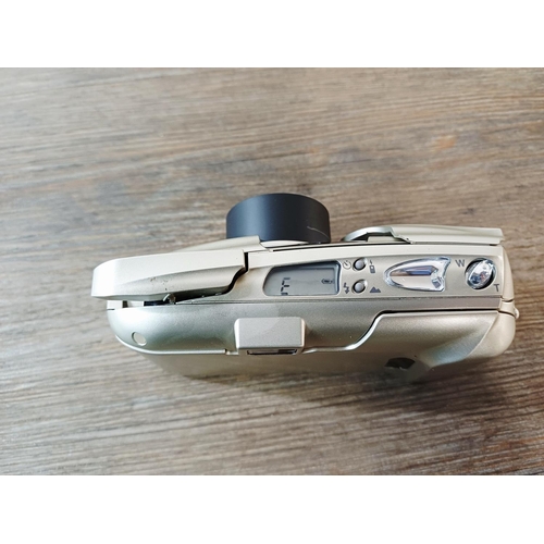 182 - A cased silver Olympus µ[mju:]-II Zoom 80 all-weather compact 35mm camera with remote control