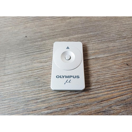 182 - A cased silver Olympus µ[mju:]-II Zoom 80 all-weather compact 35mm camera with remote control