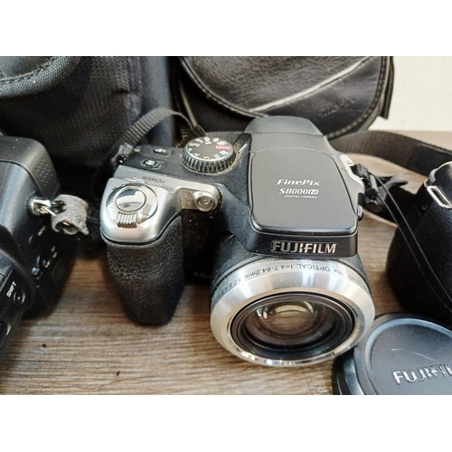 188 - Six digital cameras to include Panasonic Lumix DMC-G5 Micro Four Thirds 16mp CMOS sensor mirrorless ... 