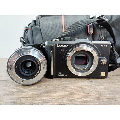 190 - Two cased Panasonic Lumix digital cameras with batteries, one DMC-GF1 Micro Four Thirds 12mp CMOS se... 