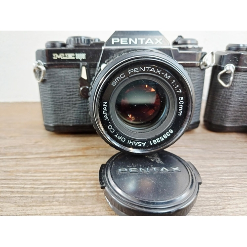 193 - Two black Pentax ME Super 35mm SLR cameras, one fitted with smc Pentax-M 1:1.7 50mm lens and one fit... 