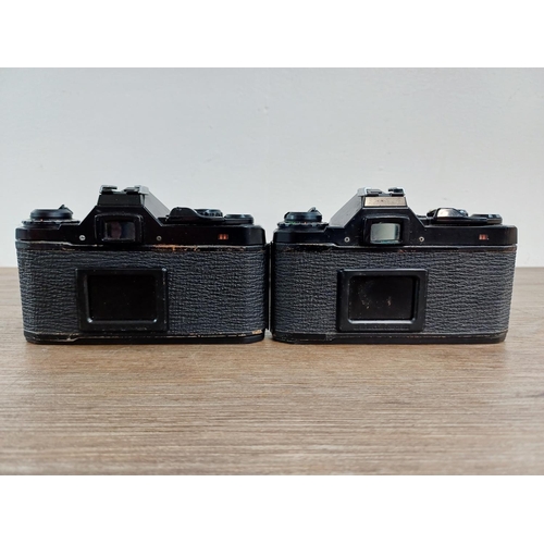 193 - Two black Pentax ME Super 35mm SLR cameras, one fitted with smc Pentax-M 1:1.7 50mm lens and one fit... 
