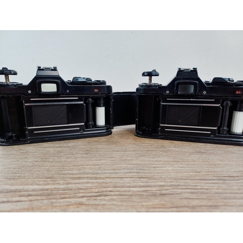 193 - Two black Pentax ME Super 35mm SLR cameras, one fitted with smc Pentax-M 1:1.7 50mm lens and one fit... 