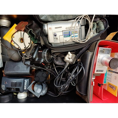 197 - A box containing cameras and photography accessories