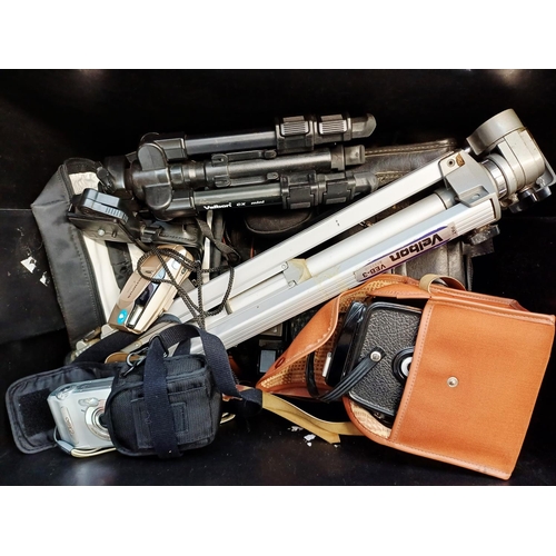 202 - A box containing cameras and photography accessories