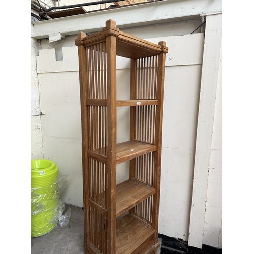 1108 - An Indonesian teak four tier shelving unit/open bookcase - approx. 194cm high x 59cm wide x 38cm dee... 