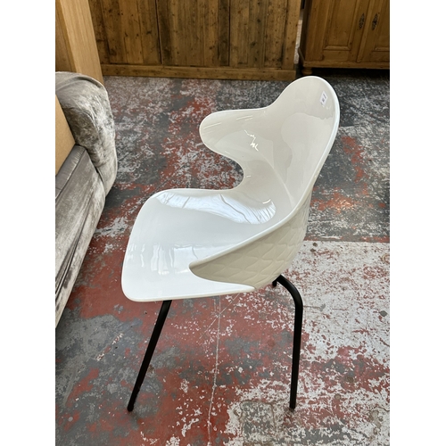 1120 - Four Italian Calligaris Saint Tropez white plastic and black tubular metal dining chairs