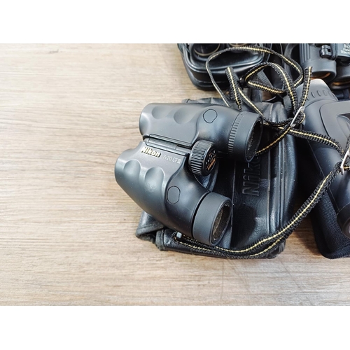 204 - Twenty-three cased pairs of pocket binoculars to include Nikon 7x20 CF III, two Nikon Sport Lite 10x... 