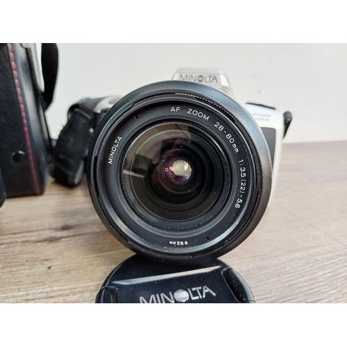 206 - A Minolta Dynax 505si autofocus 35mm SLR camera fitted with AF 1:3.5-5.6 28-80mm zoom lens with case... 