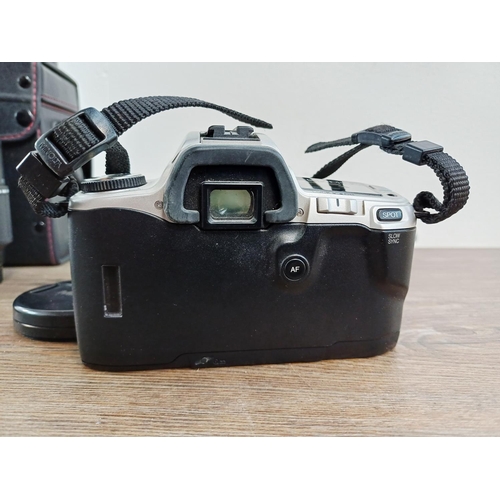 206 - A Minolta Dynax 505si autofocus 35mm SLR camera fitted with AF 1:3.5-5.6 28-80mm zoom lens with case... 
