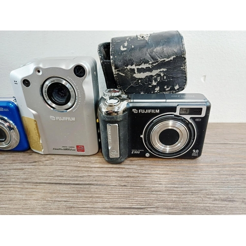 214 - Eleven Fujifilm FinePix digital cameras to include AX650 16mp compact, S5700 7.1mp CCD sensor bridge... 