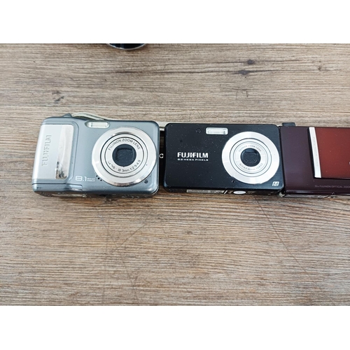 214 - Eleven Fujifilm FinePix digital cameras to include AX650 16mp compact, S5700 7.1mp CCD sensor bridge... 