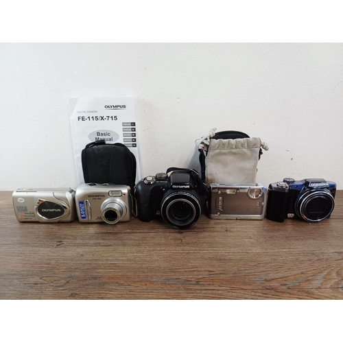 215 - Five Olympus digital cameras to include SZ-30MR 16mp CMOS sensor, µ725SW 7.1mp shock/waterproof, SP-... 