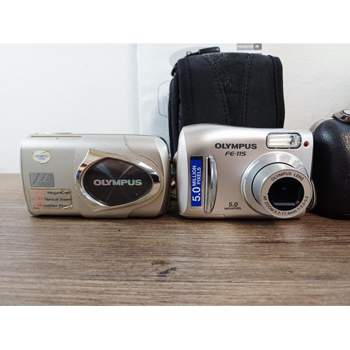 215 - Five Olympus digital cameras to include SZ-30MR 16mp CMOS sensor, µ725SW 7.1mp shock/waterproof, SP-... 