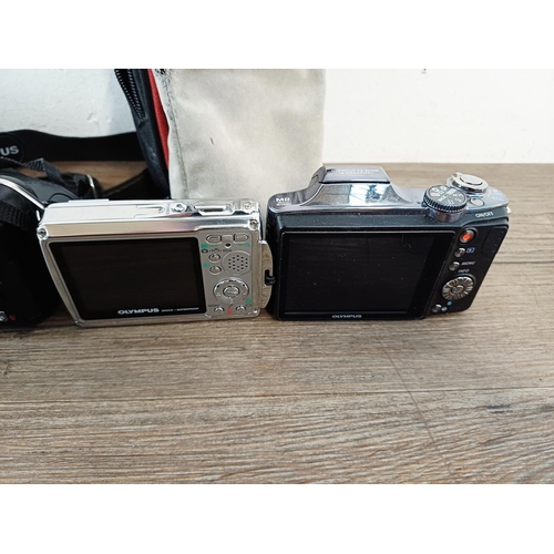 215 - Five Olympus digital cameras to include SZ-30MR 16mp CMOS sensor, µ725SW 7.1mp shock/waterproof, SP-... 