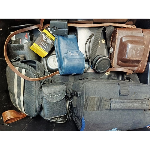 226 - A box containing cameras and photography accessories