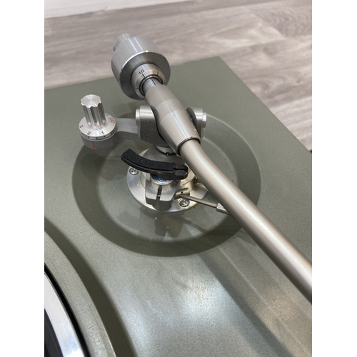 A Micro Seiki Co. Ltd. MR-711 two-speed direct-drive turntable fitted ...