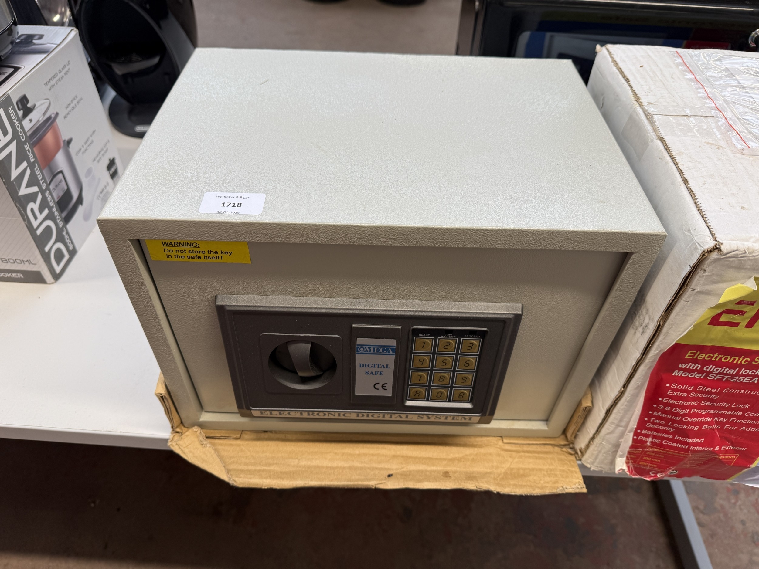An Omega digital electronic safe with keys