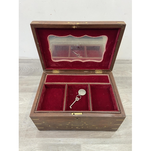 1110 - An Indian brass and copper inlaid jewellery box with fitted interior - approx. 20cm high x 38cm wide... 