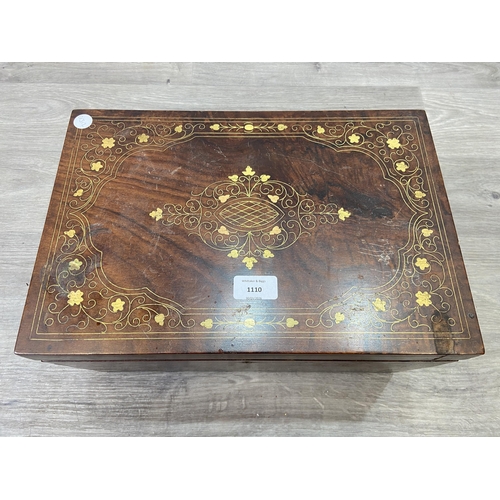 1110 - An Indian brass and copper inlaid jewellery box with fitted interior - approx. 20cm high x 38cm wide... 