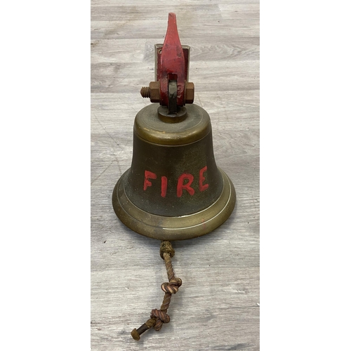 A hand painted brass wall mountable fire bell - approx. 23cm high
