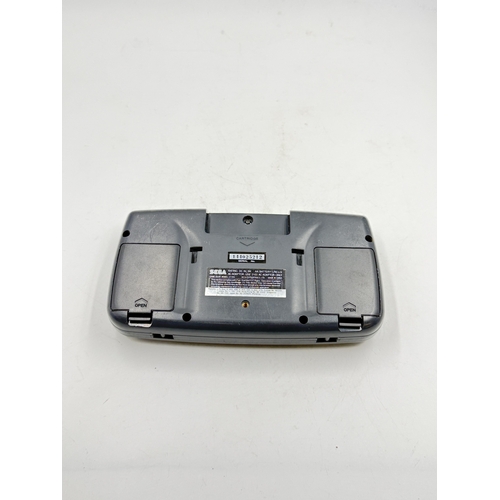 213 - A SEGA Game Gear handheld game console