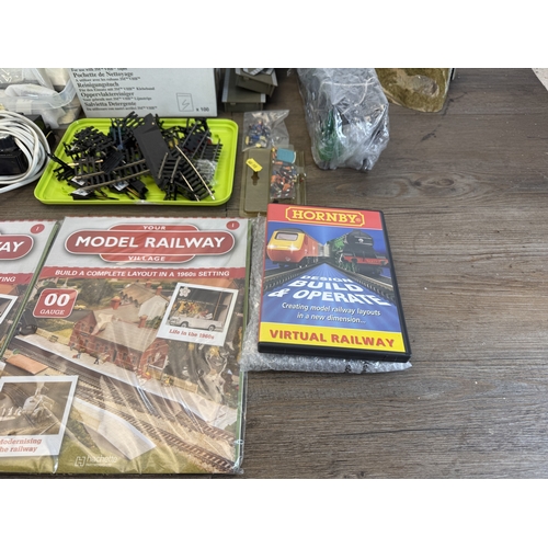 62 - A collection of model railway accessories to include Inter-City 125 N gauge engine and coach, Flying... 