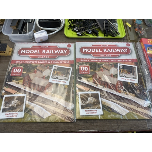 62 - A collection of model railway accessories to include Inter-City 125 N gauge engine and coach, Flying... 