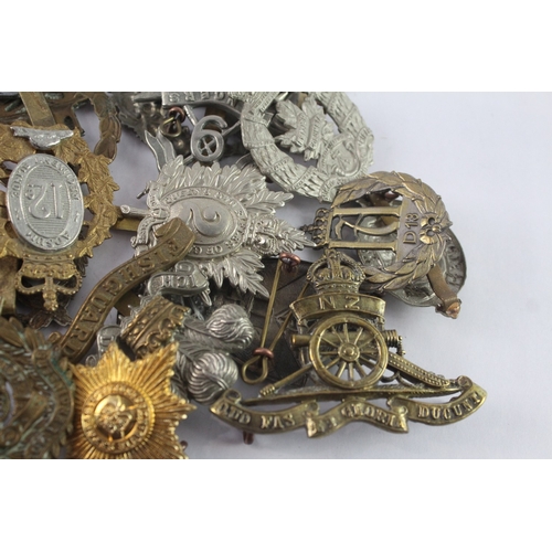 A collection of military cap badges