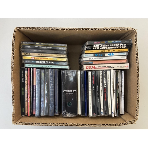 A box containing forty two CDs by Radiohead, R.E.M., Coldplay and ...