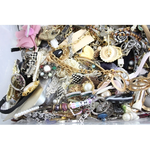 285 - A collection of costume jewellery and accessories to include pin badges, necklaces etc.