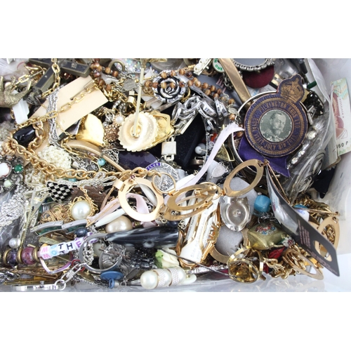 285 - A collection of costume jewellery and accessories to include pin badges, necklaces etc.