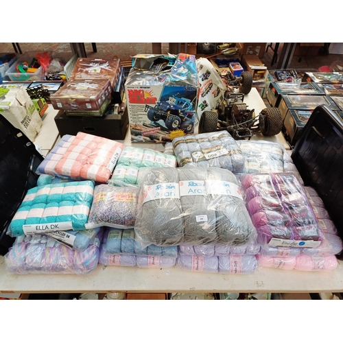 349 - A large quantity of knitting yarn to include Robin Aran 100% acrylic, Sirdar 49% cotton, Sirdar Pano... 