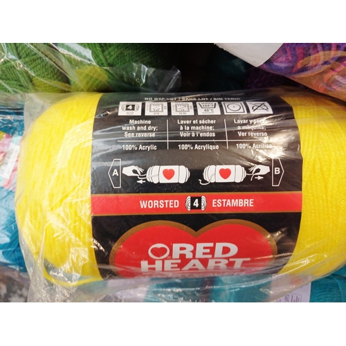 354 - A large collection of knitting yarn to include Red Heart 100% acrylic, Stylecraft Life Aran 25% wool... 