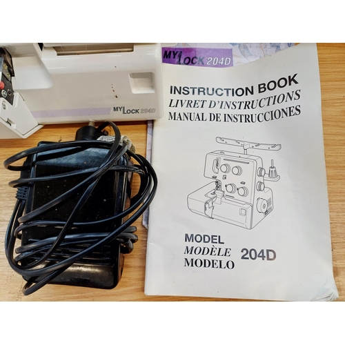 358 - A cased Janome My Lock 204D overlocker with foot pedal and instruction manual