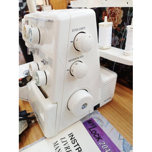 358 - A cased Janome My Lock 204D overlocker with foot pedal and instruction manual