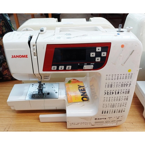 359 - A cased Janome QXL605 electric sewing machine