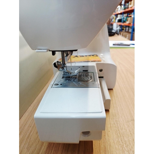 359 - A cased Janome QXL605 electric sewing machine