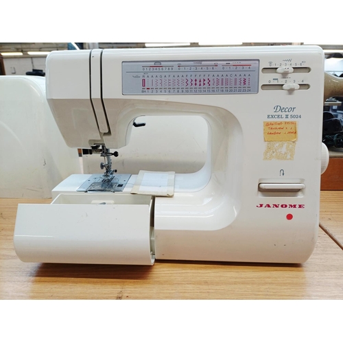360 - A cased Janome Decor Excel II 5024 electric sewing machine